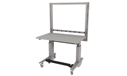 electric height adjustable Symbiote ErgoStat on casters with laminate surface, riser frame, plug strip, foot rest