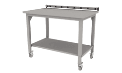 manual height adjustable Symbiote 4-Legged table on casters with laminate surface, surface mounted plug strip and lower shelf